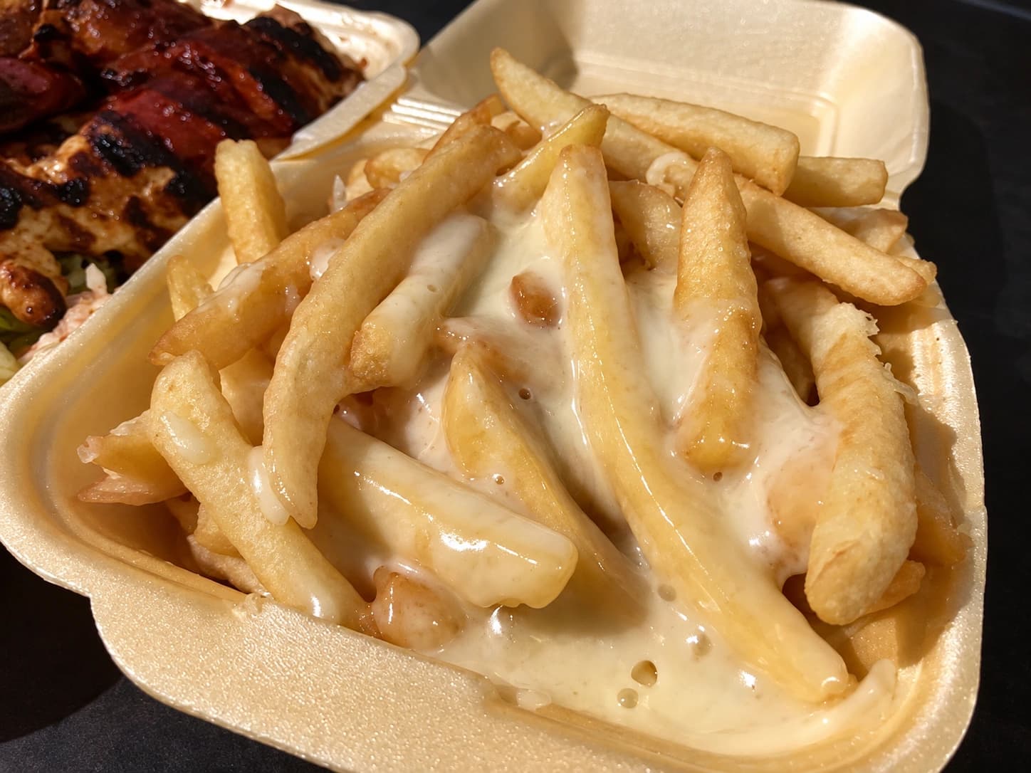Chips covered in melted cheese